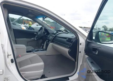 2014 Toyota Camry Hybrid Le z USA, uszkodzony, nr VIN 4T1BD1FK2EU098021